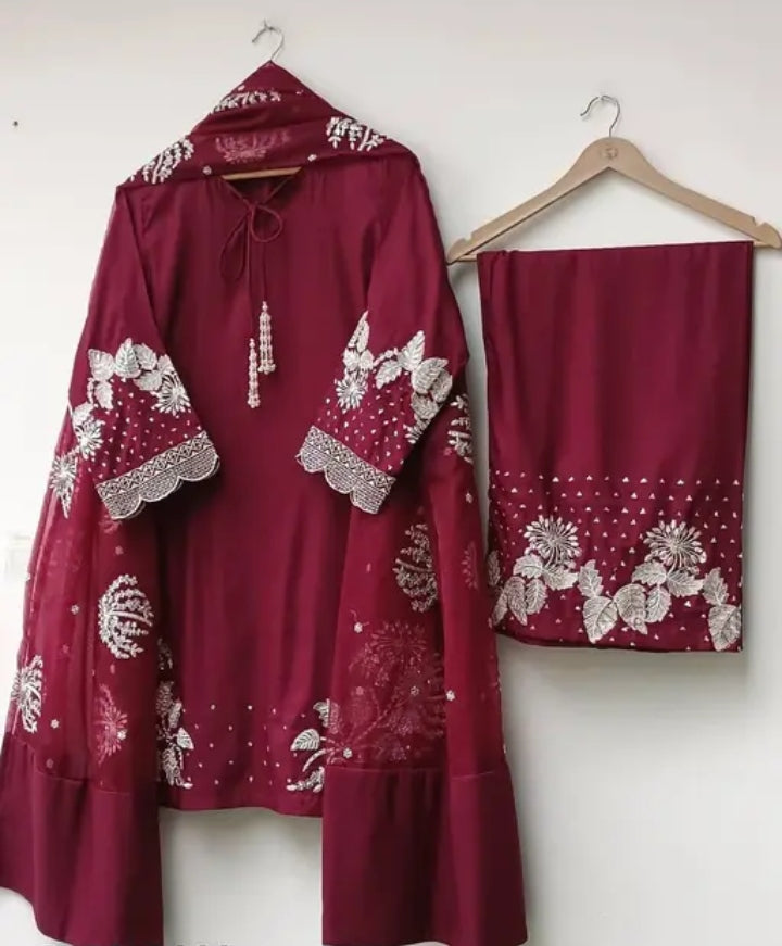 Stunning maroon salwar suit set, featuring intricate white embroidery